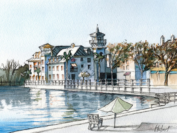 Watercolor of Celebration Florida lake with waterfront buildings, reflections, chair and umbrella