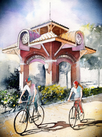 Watercolor painting of two cyclists riding past the Winter Garden clock tower in downtown Winter Garden, Florida